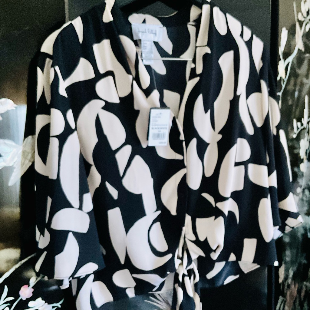 Nwt /Black And Beige Blouse With Tie On The Bottom.